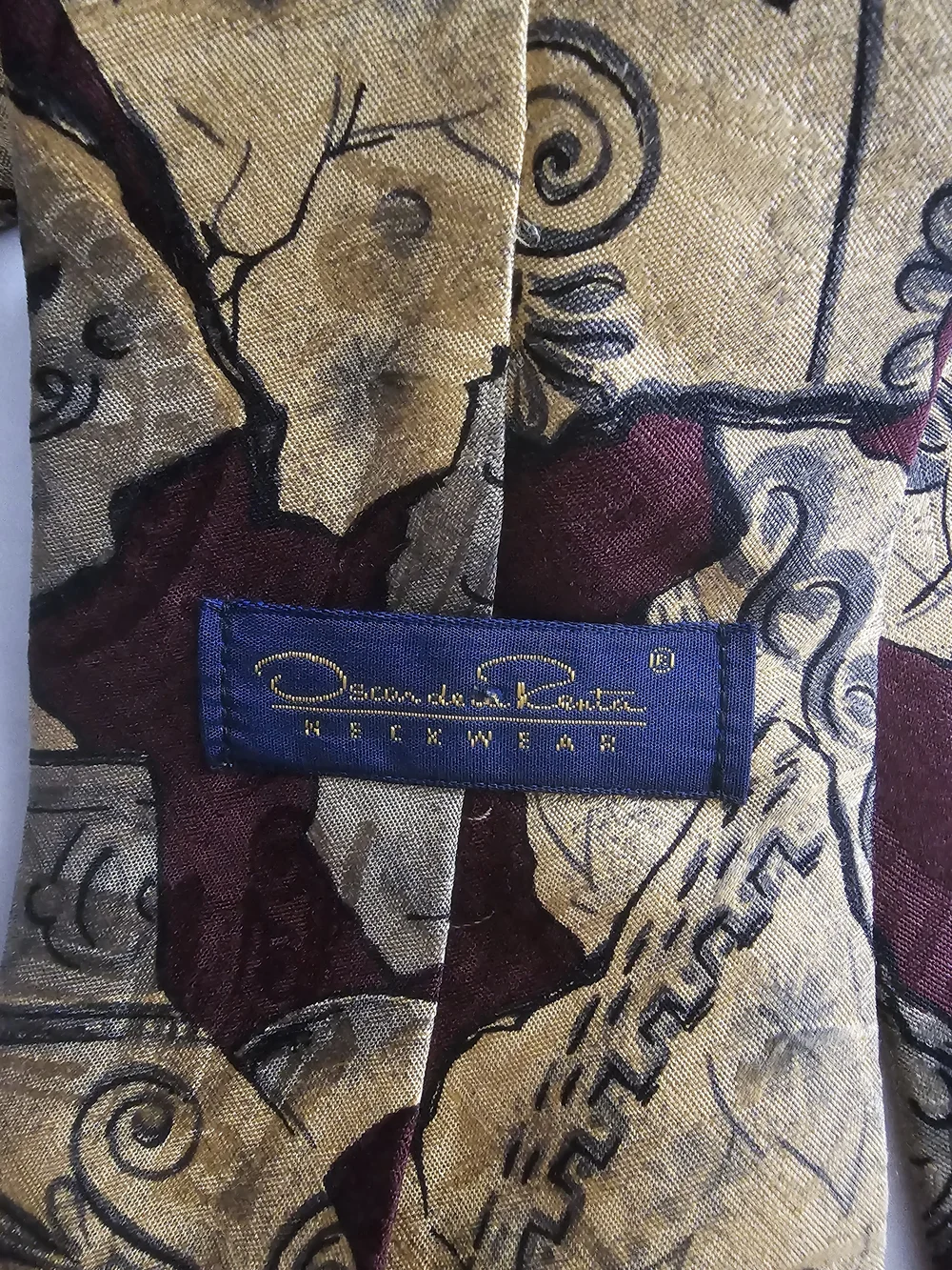 Men's Burgundy and Gold Patterned Tie